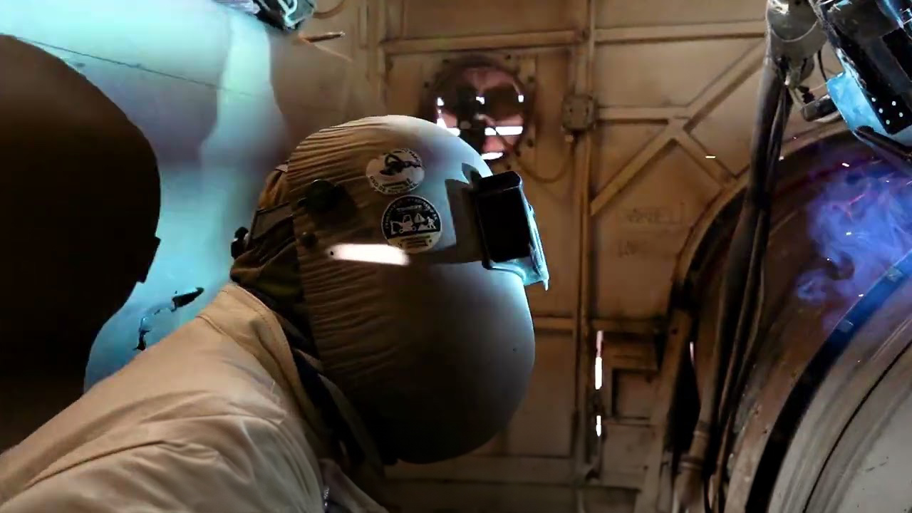 A multinational team leads the welding work on the pipeline and pumping system