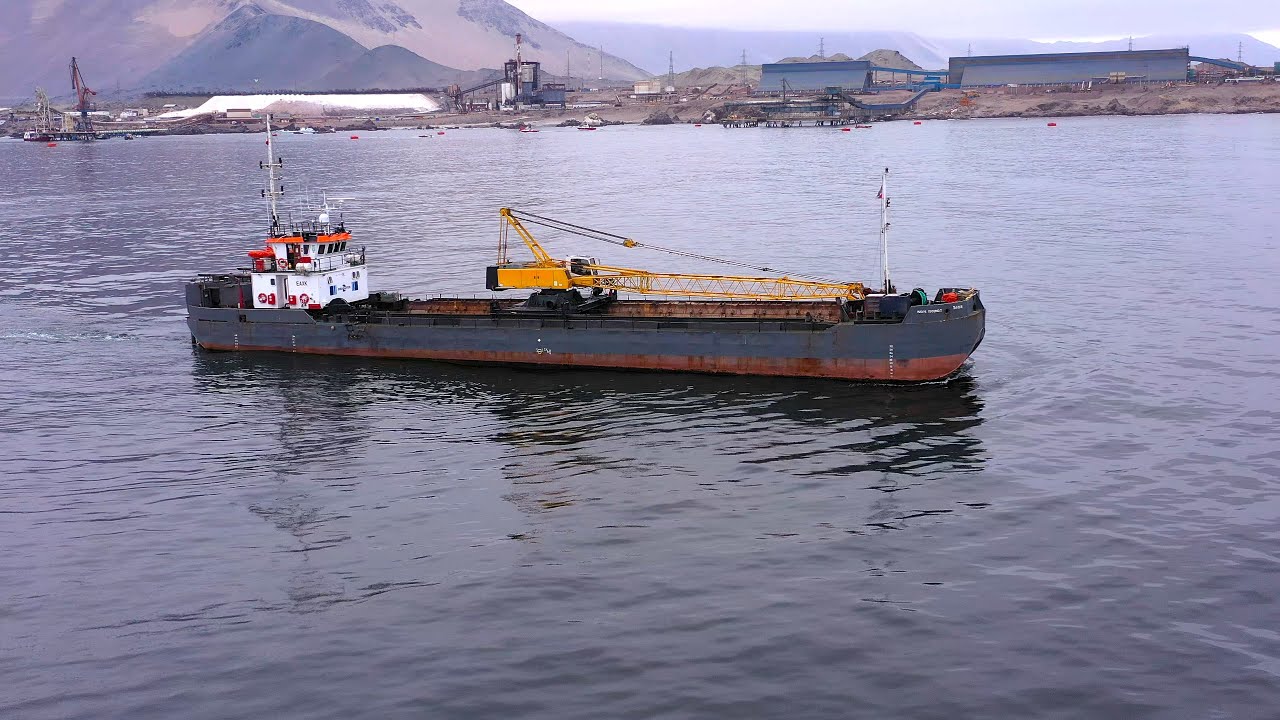 The larger hulk vessel demonstrates its versatility in the marine works of Patache